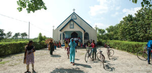 people entering a church building
