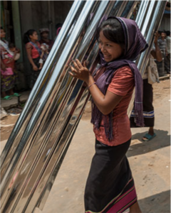 Tin Sheets - Woman Exchanges Drops of Misery for Sounds of Peace