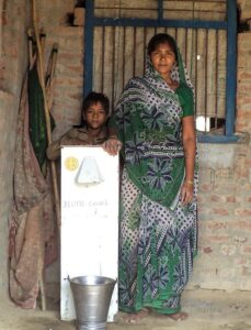 Erina with her BioSand water filter